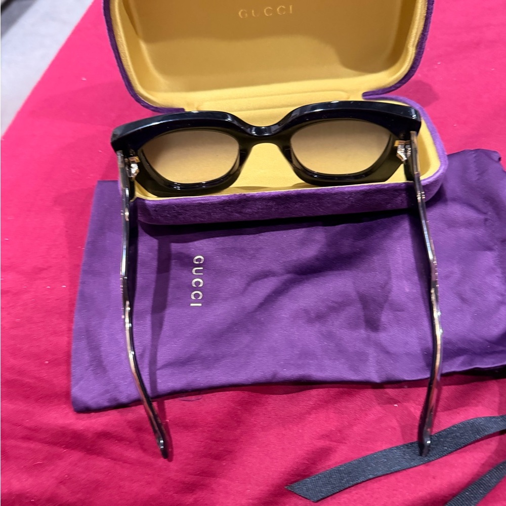 Gucci SunGlasses with both the original velvet purple case and soft silk pouch